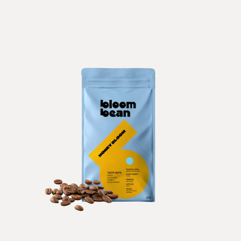 เมล็ดกาแฟคั่วกลาง Bloom Bean – รส Honey Bloom หอมละมุน เข้มกลมกล่อม ดื่มง่าย สัมผัสรสหวานมีมิติ จากกาแฟสายพันธุ์ทิปิก้า
